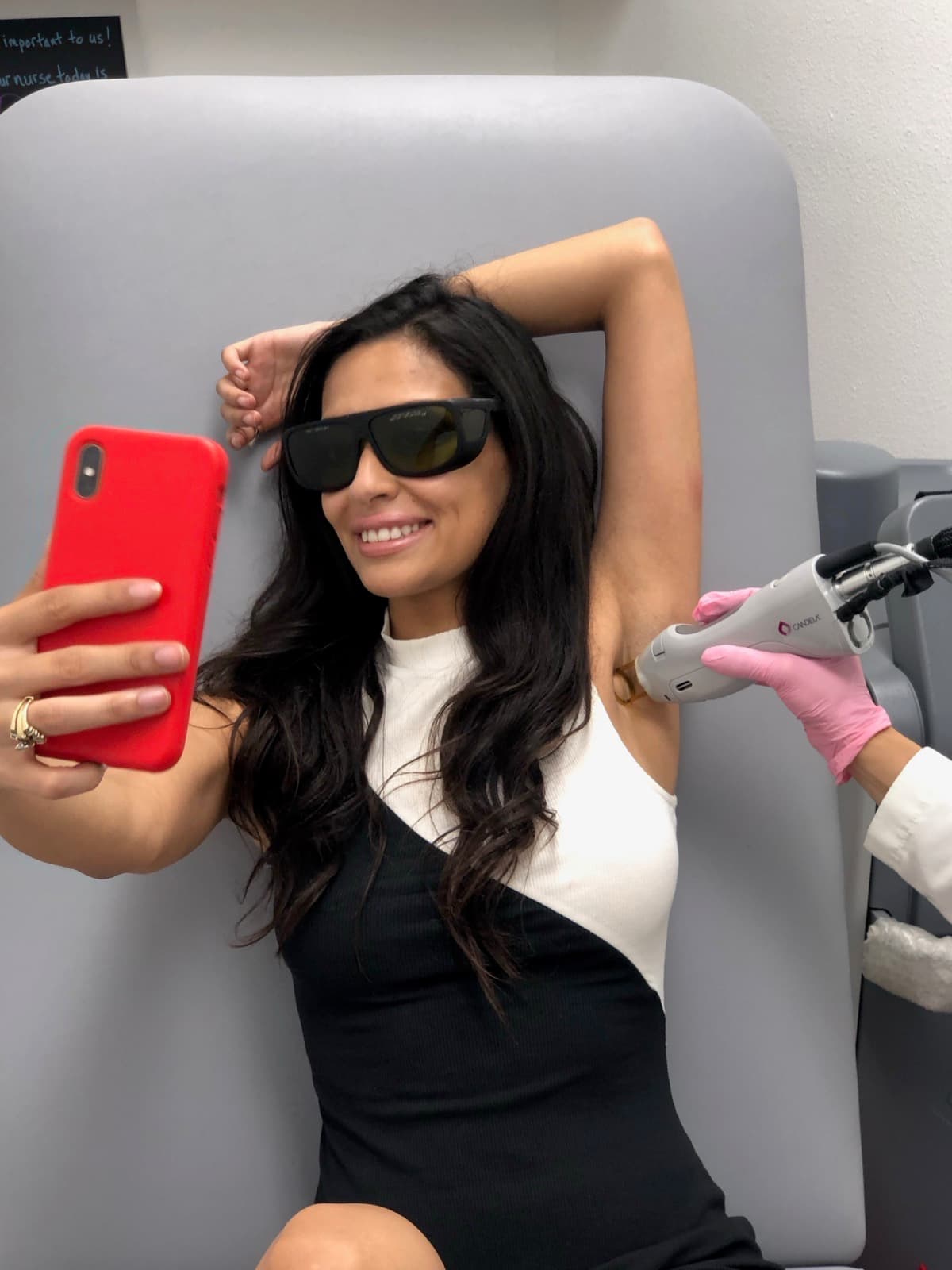 Client relaxed and smiling during laser hair removal